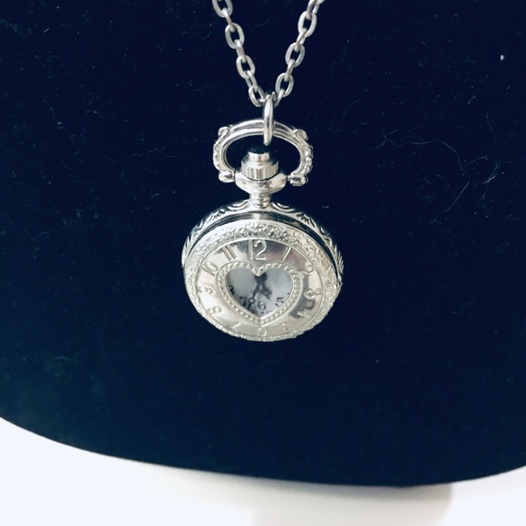 American Eagle Outfitters Jewelry - Silver watch  locket necklace